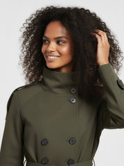 Beige Cath trench coat for women with a structured fit, high collar and dark buttons. Crafted from premium fabric, it highlights the waist and adds refined elegance to any autumn or winter outfit.