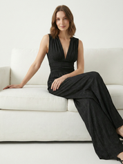 Black sleeveless jumpsuit with deep V neckline, ruched waist and wide-leg trousers