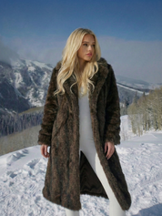 Long faux fur coat in deep brown tones with wide lapel collar and full-length silhouette