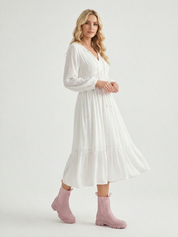 Pink waterproof ankle boot with elastic side panels, pull tabs and chunky lug sole