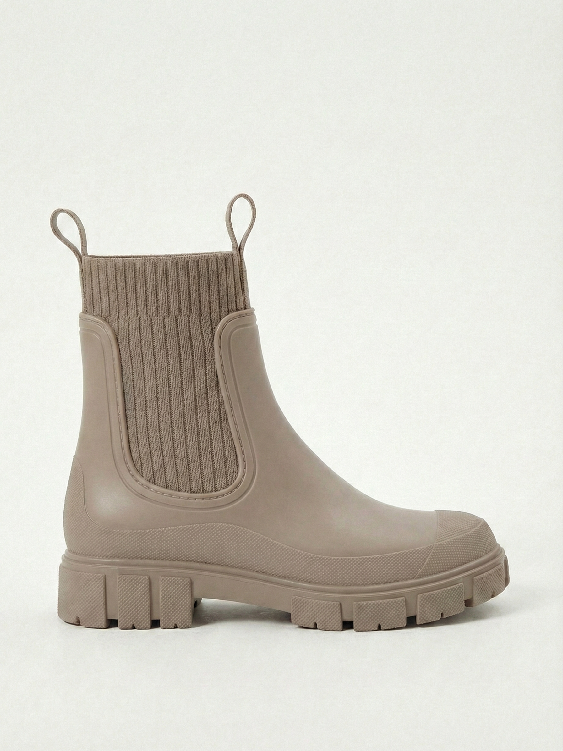 Apricot waterproof ankle boot with elastic side panels, pull tabs and chunky lug sole