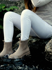 Apricot waterproof ankle boot with elastic side panels, pull tabs and chunky lug sole