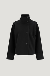 Black high-neck jacket with asymmetrical buttons and structured silhouette, featuring wide sleeves and a minimalist design for modern everyday styling.